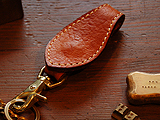 �x���g�ɂ��t������L�[�z���_�[